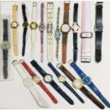 A collection of watches including Swatch