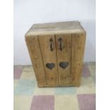 A rustic pine cupboard