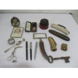 A collection of interesting items including a pair of SCM ribbon scissors in the form of a stork