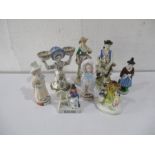 A collection of eight porcelain figurines including Continental, Staffordshire etc