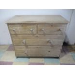 An stripped elm chest of four drawers (replacement back)