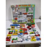 A collection of various toy cars, farm set etc