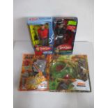 Two boxed Captain Scarlet action figures including Captain Black, along two sealed Action Man kits