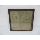 A framed sampler, named Betty Kershaw and dated 1821