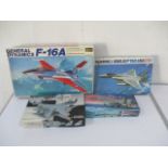 A collection of four boxed fighter jet model kits including Hasegawa, Tamiya, Fujumi etc