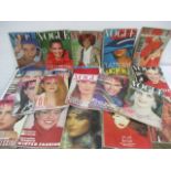 A collection of twenty Vogue magazines dating from 1976 to 1983
