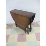 An oak drop leaf table