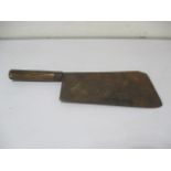 A vintage butchers cleaver with wooden handle