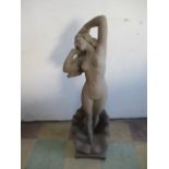 A statue of a nude lady in shell 107cm in height A/F