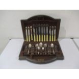 A canteen of cutlery in oak case