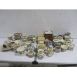 A collection of Honiton Pottery including small vases, pin dishes, jugs, lidded pots etc