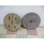 Two vintage wooden milling style wheels