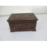 A Victorian carved box with the letter 'S' in the lid