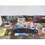 A collection of 12" & 7" vinyl records including Elvis Presley, Don McLean, Franl Sinatra, Status