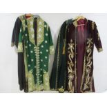 Four pieces of Syrian clothing- a cape, kaftan, over coat etc. all with gold coloured detailing