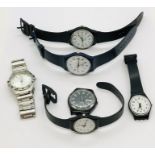 A collection of watches, mainly Swatch