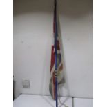 A vintage British made union flag on wooden pole