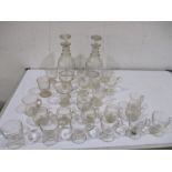 A pair of Georgian decanters ( ill fitting stoppers) along with a collection of 24 glass custard