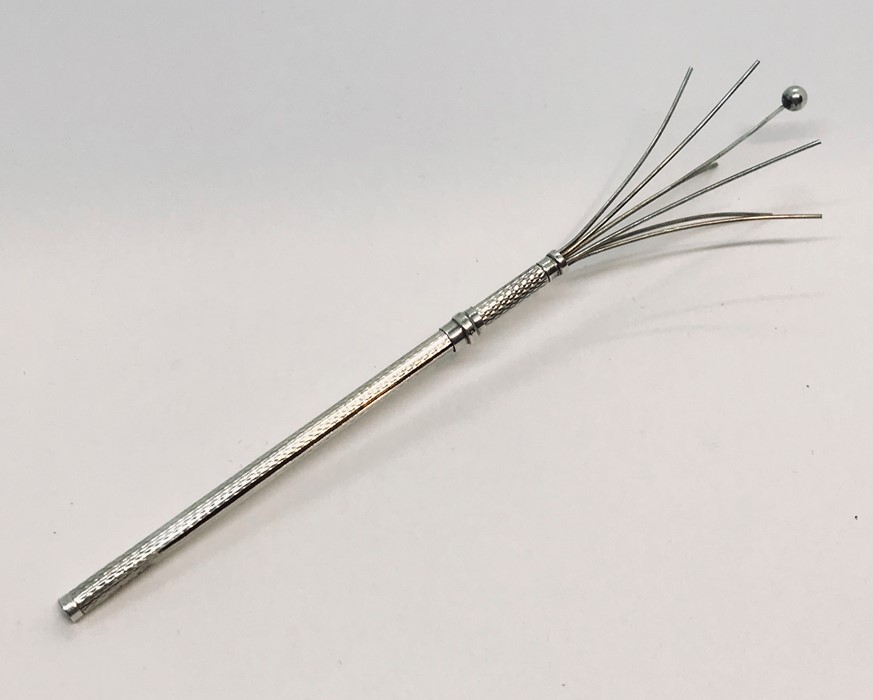 A hallmarked silver swizzle stick A/F