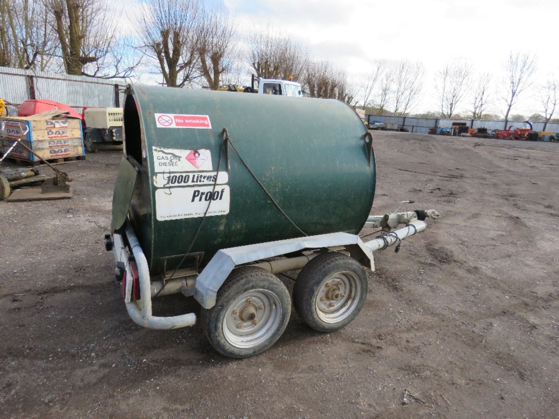 FUEL PROOF 1000 LTRE TWIN AXLED ROAD TOWED BUNDED DIESEL BOWSER WITH 12 VOLT PUMP AND HOSE. DIRECT