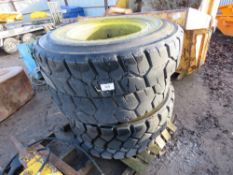 Set of 4no. 10.00-20 solid wheels and tyres, 9 stud centres