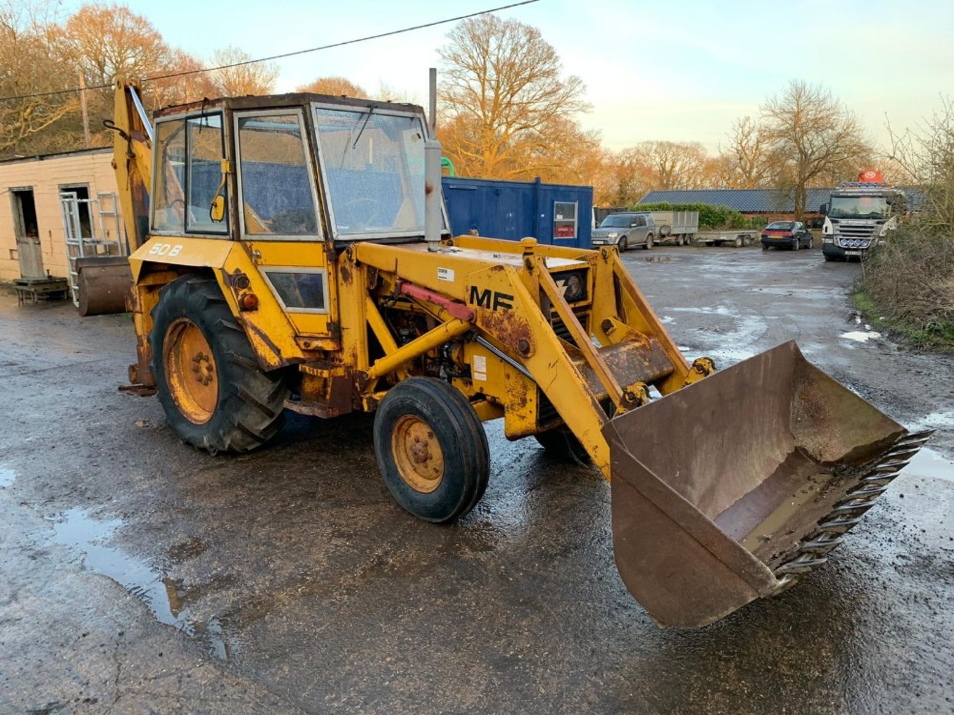 MASSEY FERGUSON 50B BACKHOE LOADER C/W FRONT BUCKET, MUCK FORK, AND 2 REAR BUCKETS. VENDOR'S