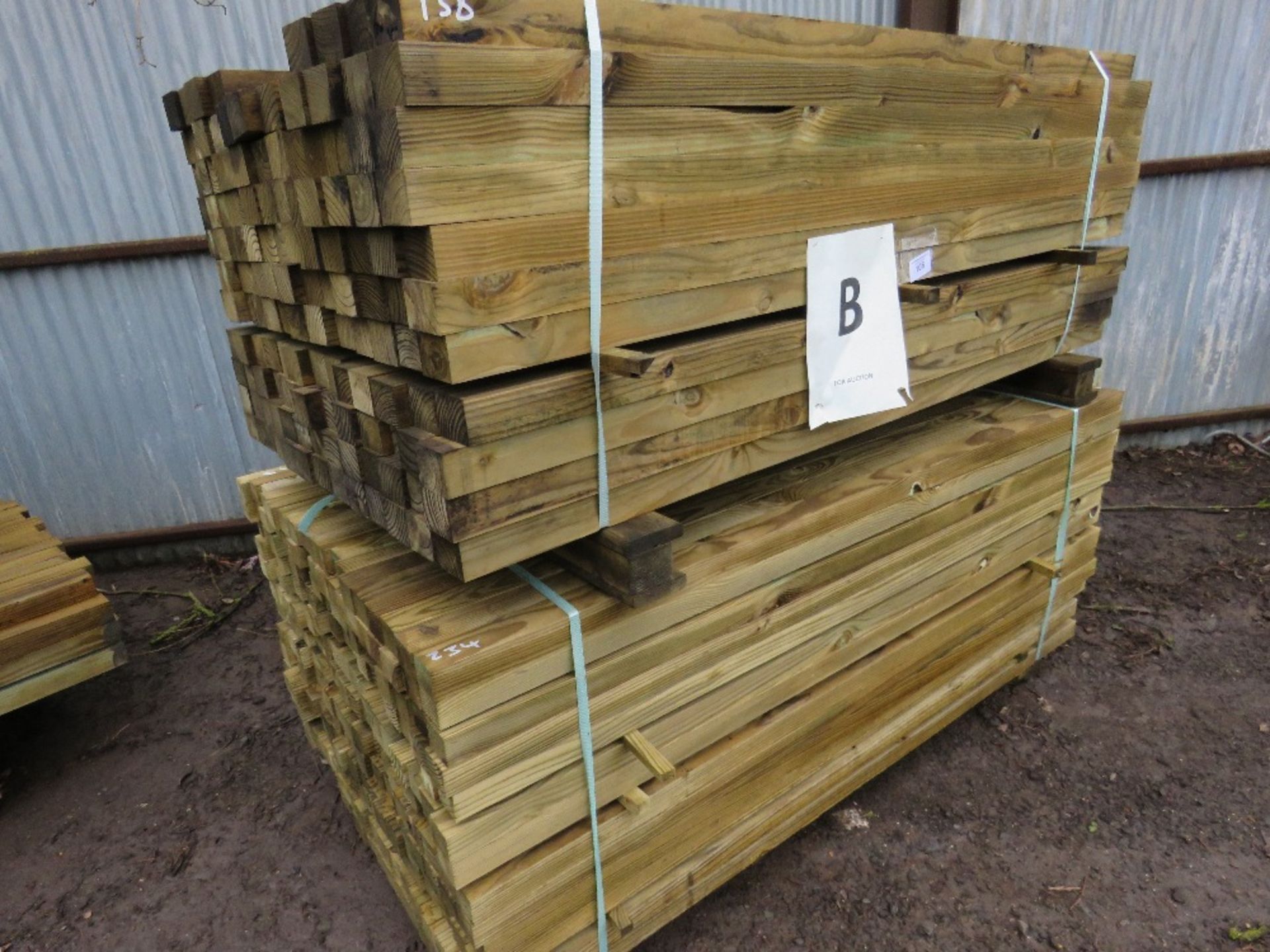 2 LARGE PACKS OF TIMBER POSTS APPROX. 372 1.8MX5.5CM