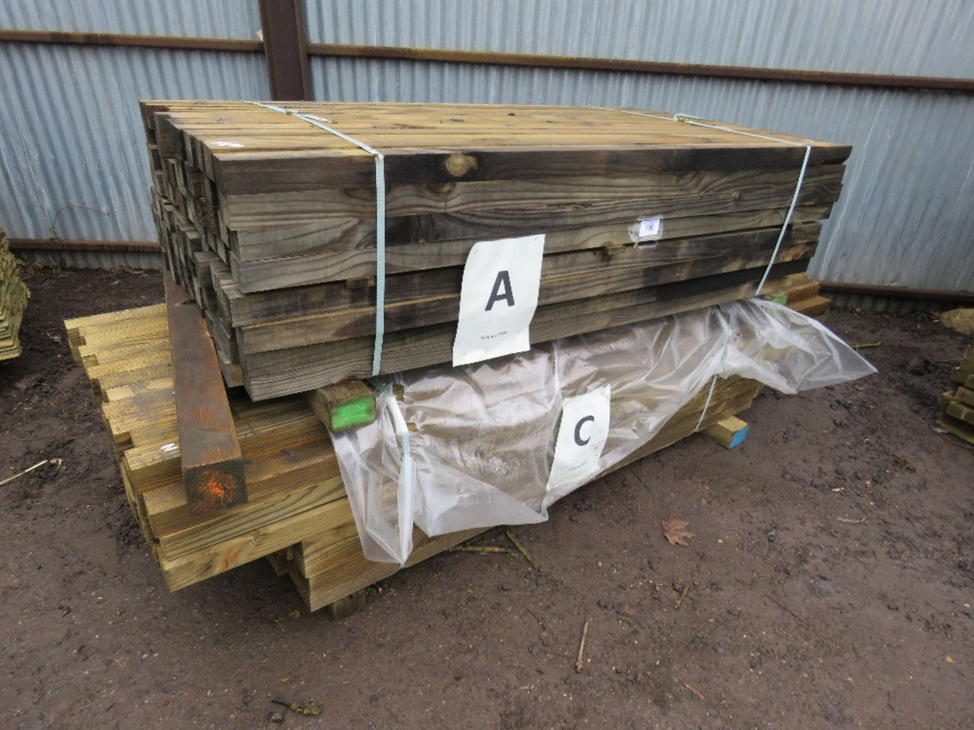 2 PACKS OF ASSORTED TIMBER FENCING POSTS APPROX. 140 TOTAL, ONE PACK 1.8MX5.5CMX7CM ONE PACK 2.4M