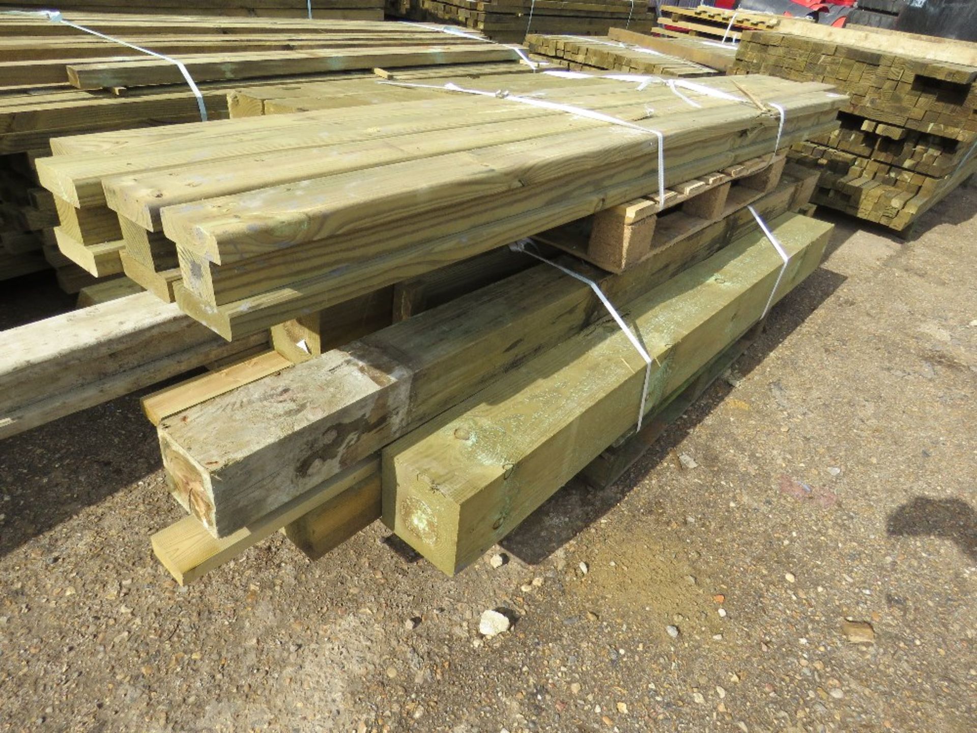 2no. Pallets containing assorted posts and timber