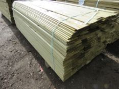 Pack of profiled fence cladding timber, 1.74m length, 10cm x 5mm approx.