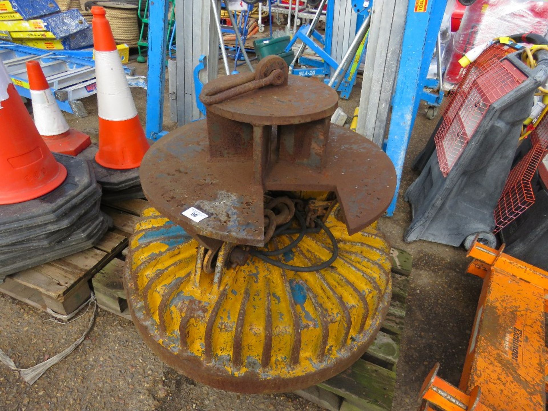 Electro magnet plus top hat unit for scrap handling, working when ...