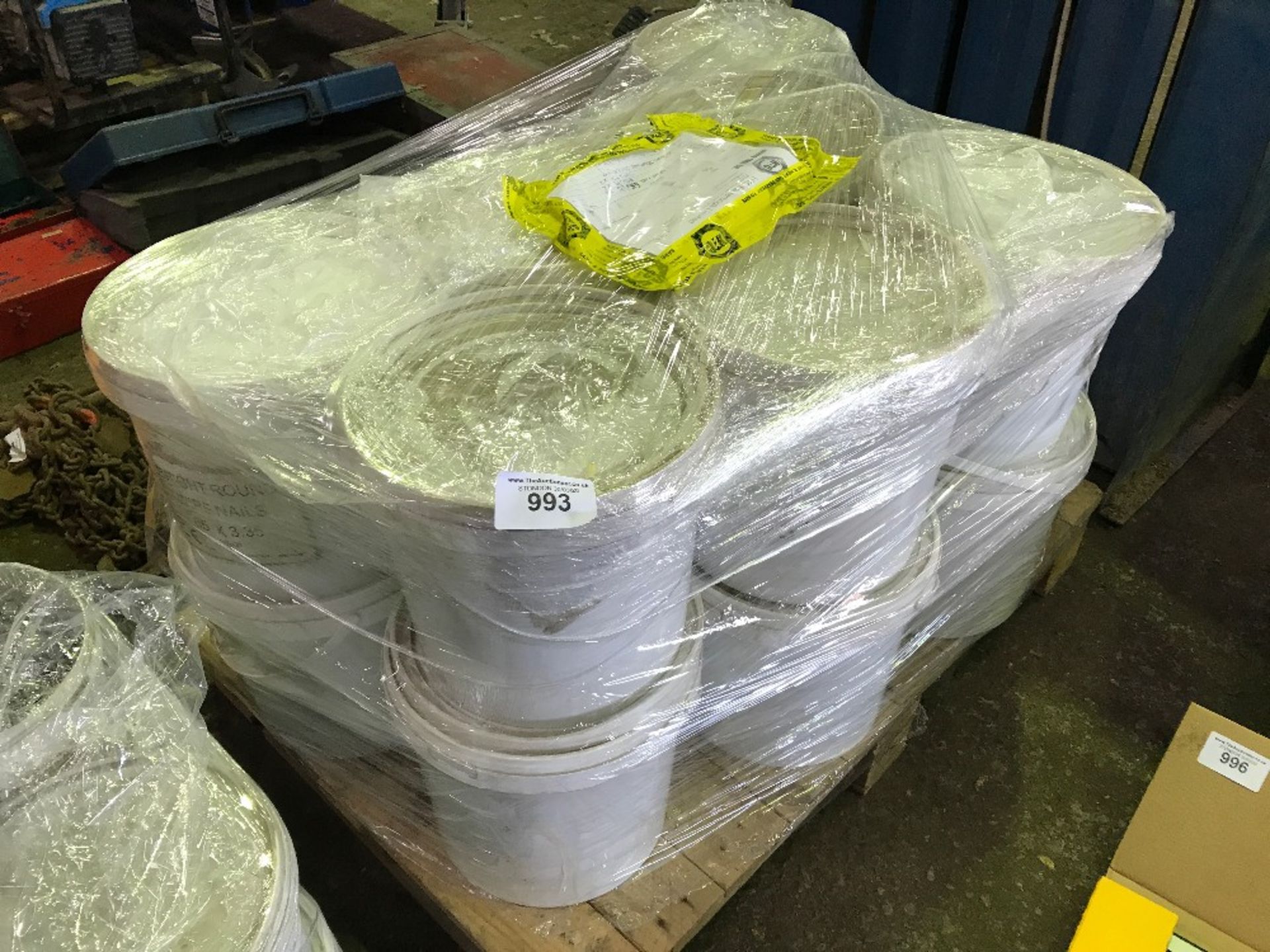 Pallet containing 14no. tubs of nails, mainly 65 x 3.35