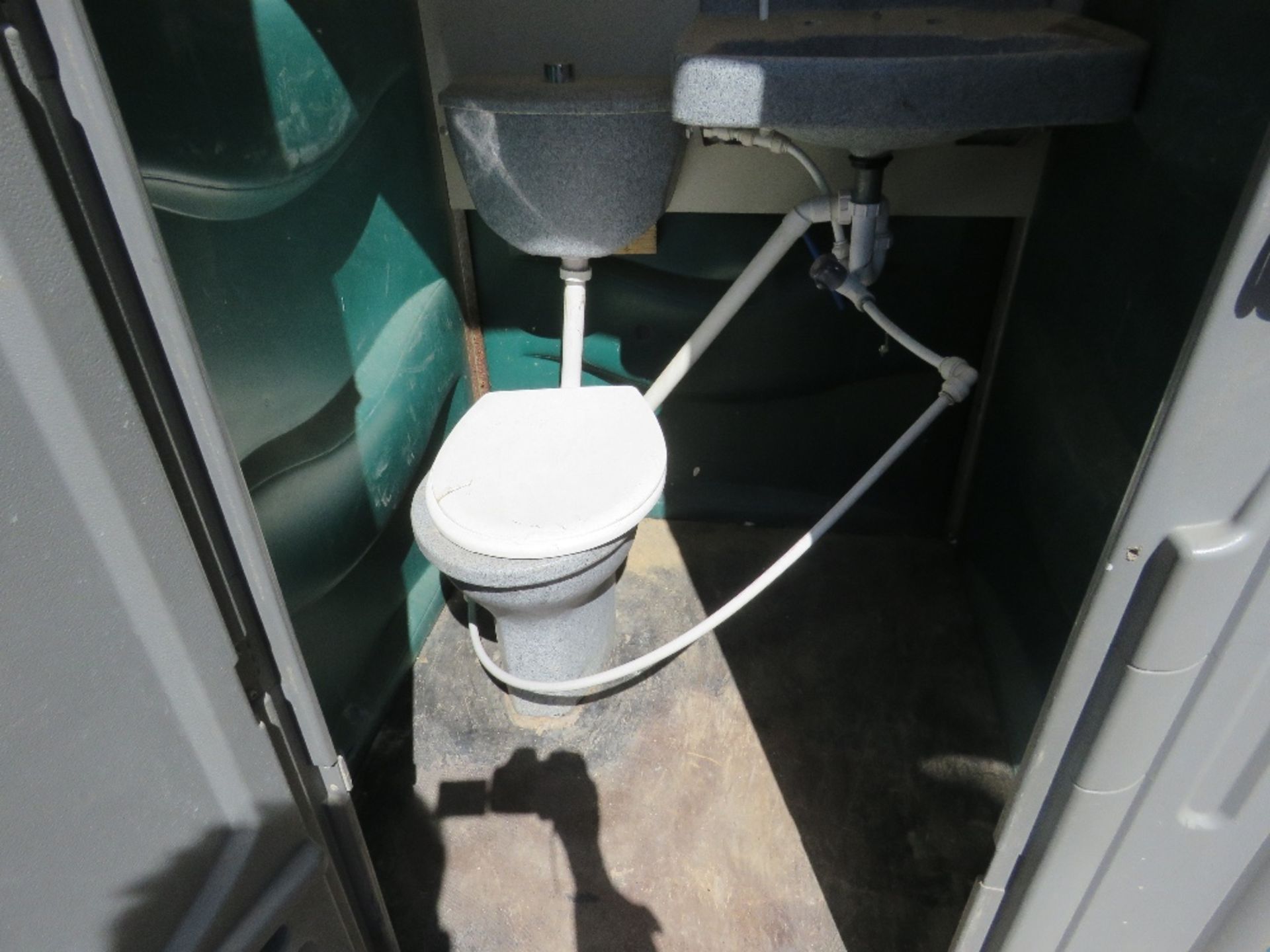 MAINS TYPE PORTABLE TOILET WITH LARGE WASH BASIN AND WATER HEATER . All items "sold as seen" or " - Image 2 of 5