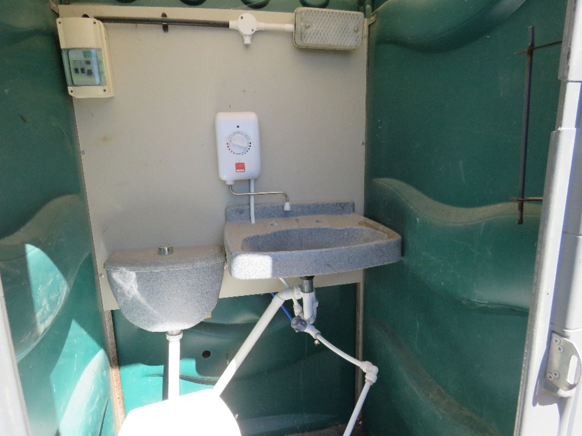 MAINS TYPE PORTABLE TOILET WITH LARGE WASH BASIN AND WATER HEATER . All items "sold as seen" or " - Image 3 of 5