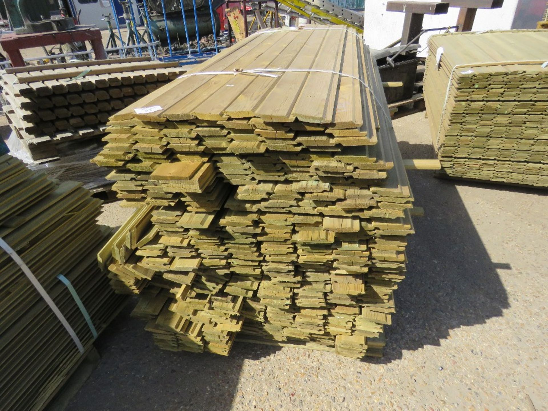 1 X LARGE PACK OF SHIPLAP TIMBER FENCE CLADDING, 1.75M X 9CM WIDE X 1.5CM DEEP APPROX - Image 2 of 3