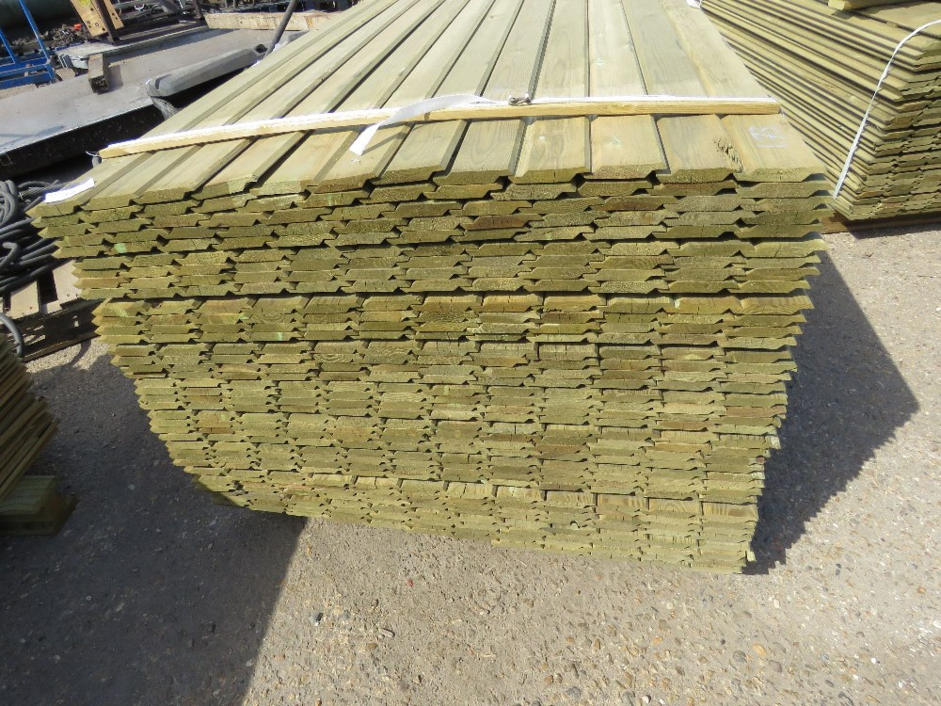 1 X PACK OF SHIPLAP TIMBER FENCE CLADDING, 1.73M X 9CM WIDE X 1.5CM DEEP APPROX - Image 2 of 3