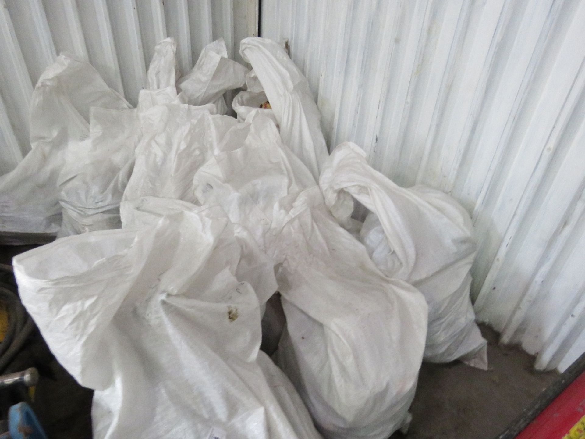 16 x Bags of assorted lorry spares to include brake discs, mirrors, bulbs, pipes and exhaust bracke