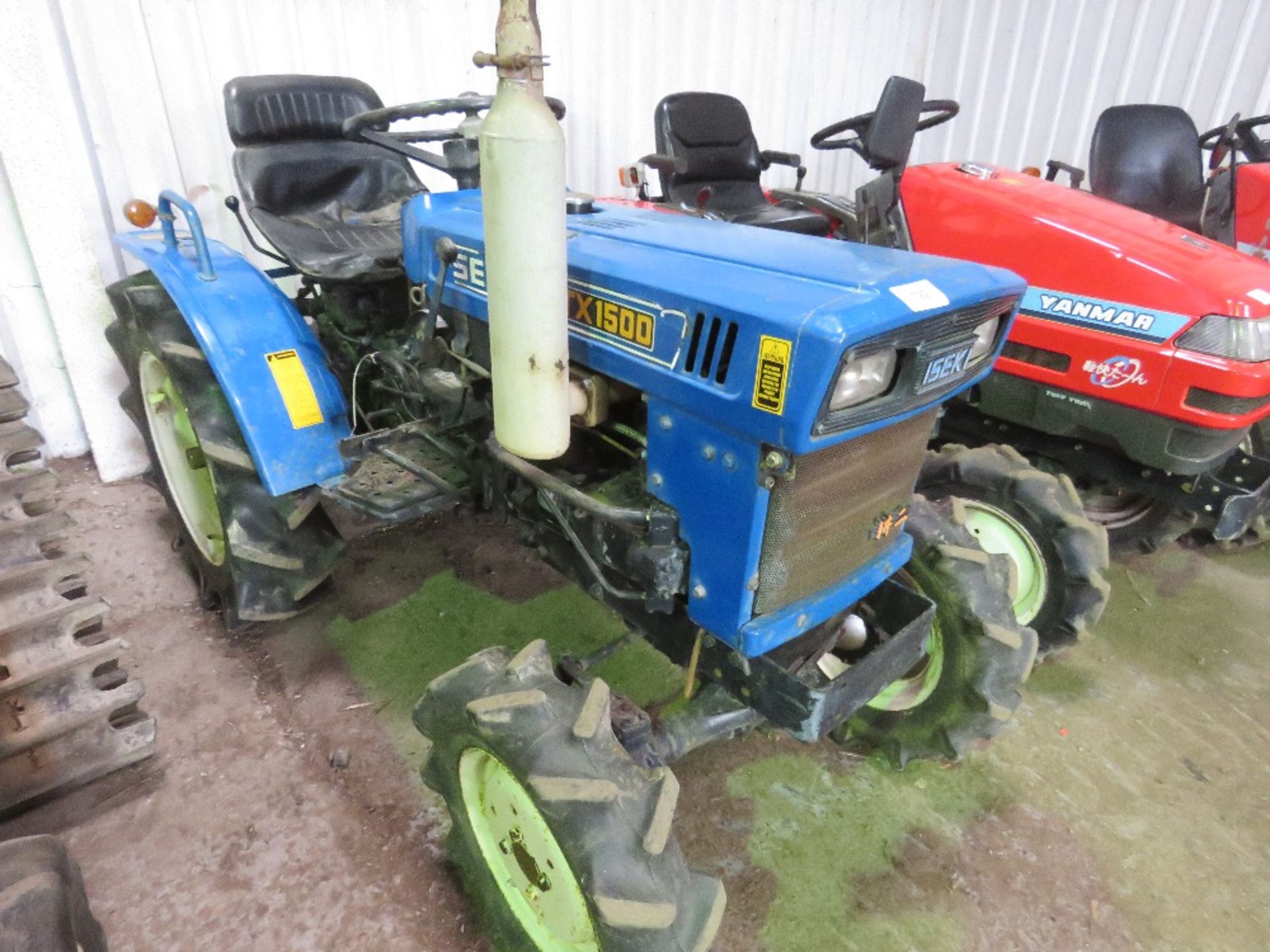 ISEKI TX1500 4WD COMPACT TRACTOR WITH REAR LINKAGE WHEN TESTED WAS SEEN TO START, DRIVE, STEER AND B