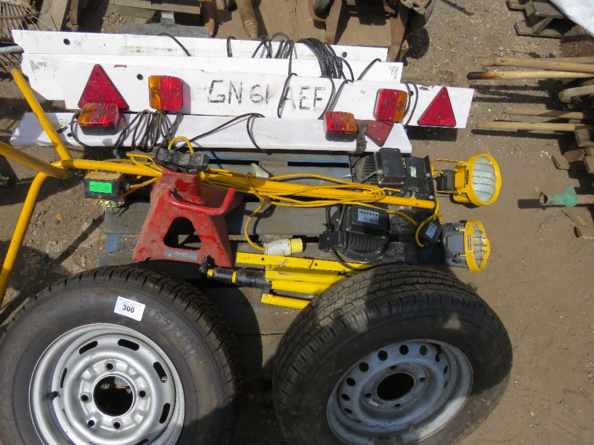 PALLET CONTAINING 2 X TRAILER WHEELS, 1 X AXLE STAND, WORK LIGHTS AND 4 X TRAILER LIGHT BOARDS