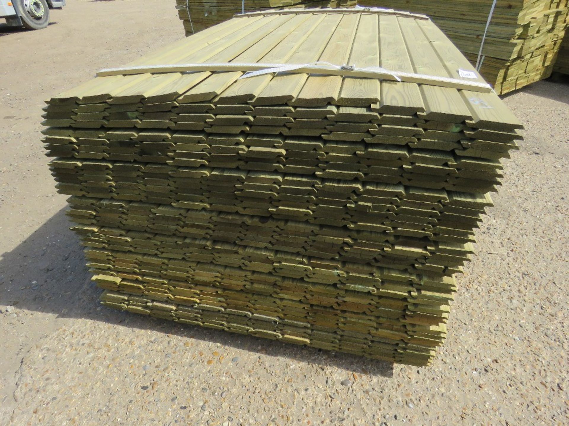 1 X PACK OF SHIPLAP TIMBER FENCE CLADDING @ 1.55M X 9CM WIDE X 1.5CM DEEP APPROX - Image 2 of 3