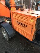 TIMBER WOLF TW150DHB TOWED CHIPPER UNIT YEAR 2006 1109 RECORDED HOURS START, RUN AND BLADES TURNED.