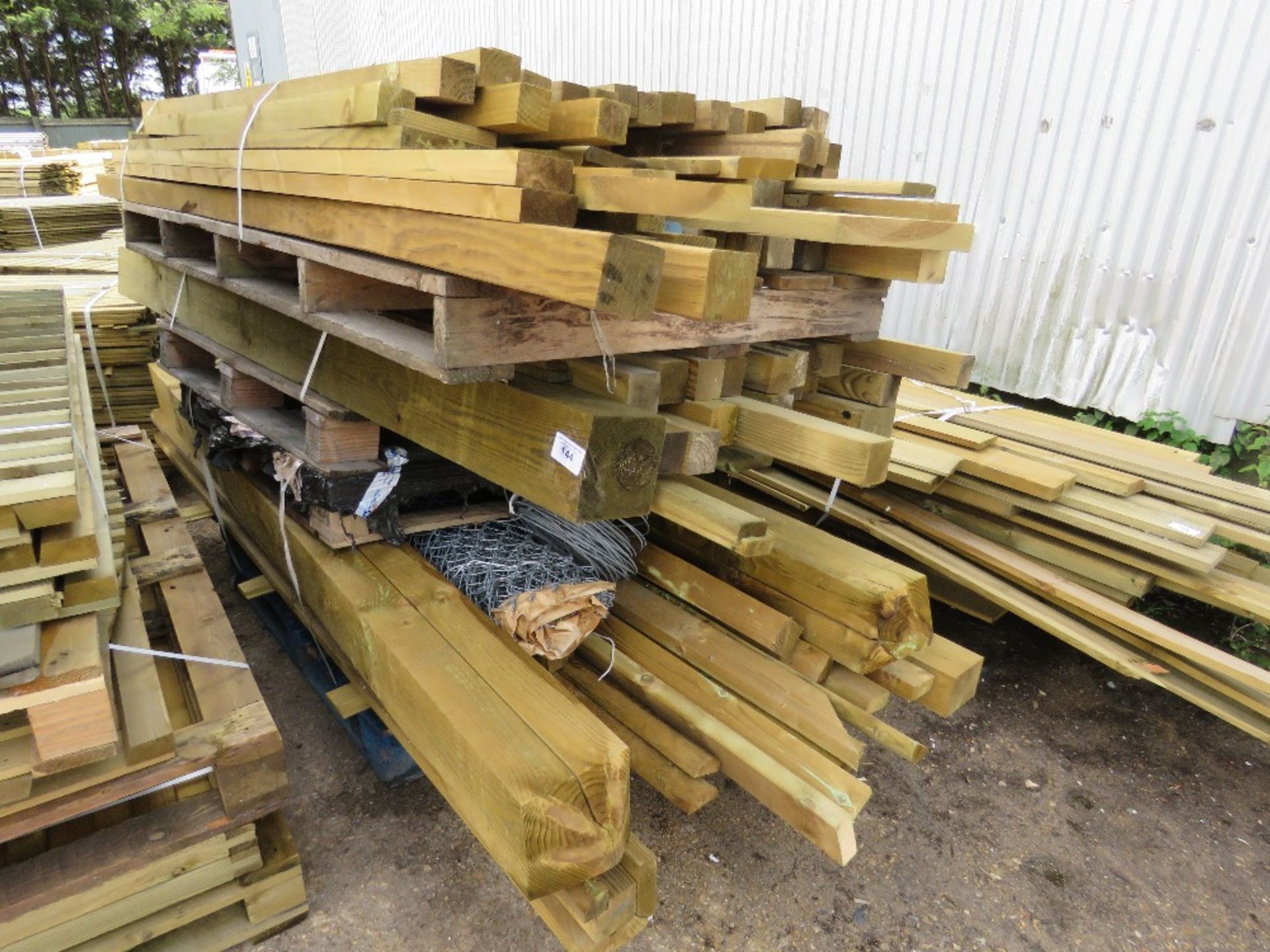 3 X PALLETS OF POSTS, TIMBERS AND ROLL OF CHAINLINK FENCING