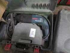 BOSCH AND HITACHI SDS DRILLS IN CASES.