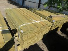 large pack of feather edge cladding timber 1.8m x 10cm.