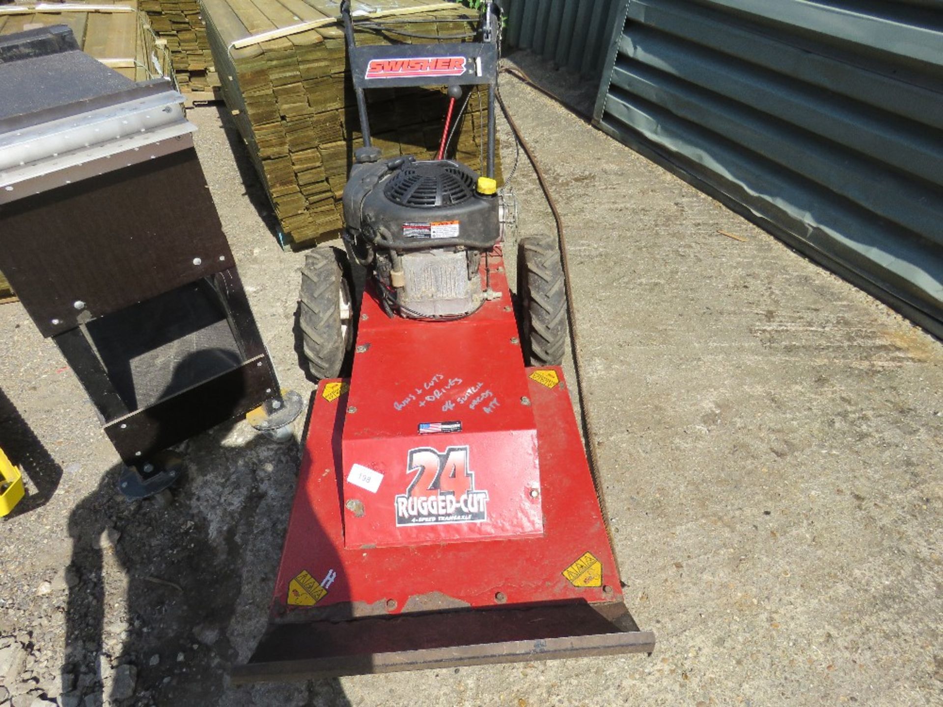 SWISHER ROUGH CUT MOWER. WHEN TESTED WAS SEEN TO RUN AND CUT....OFF SWITCH NEEDS ATTENTION.