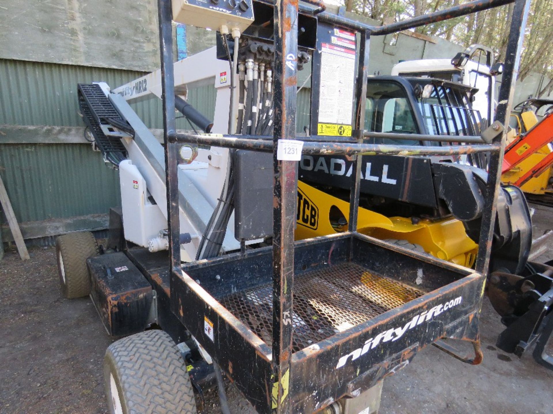NIFTY HEIGHTRIDER HR12 BOOM LIFT. DUAL FUEL. YEAR 2012. SN:12-22945. WHEN TESTED WAS SEEN TO DRIVE,