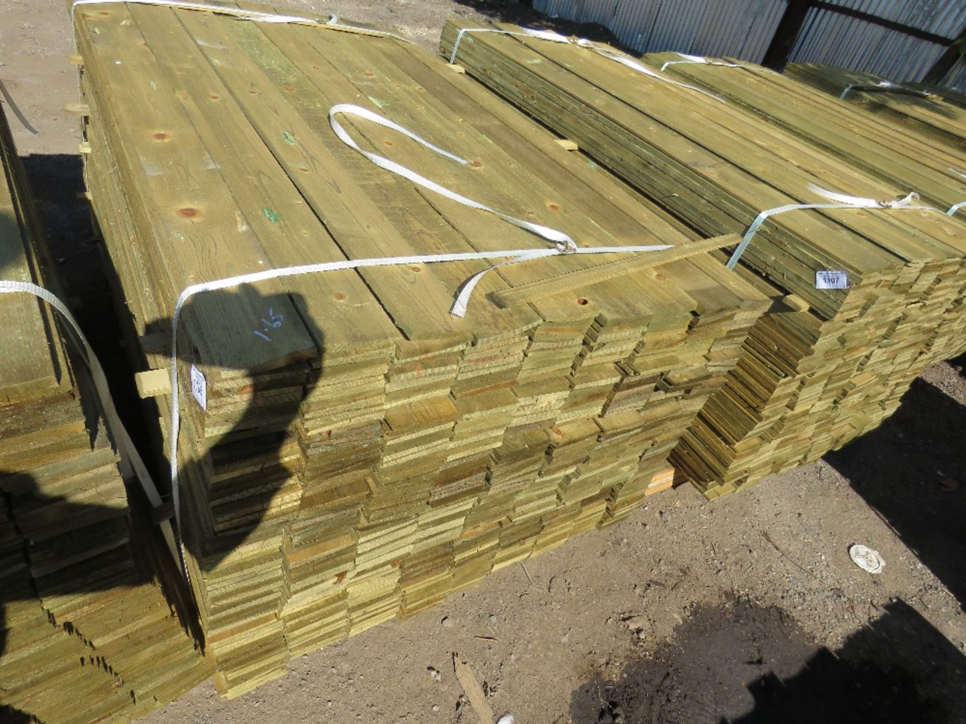 large pack of feather edge cladding timber 1.65m x 10cm.