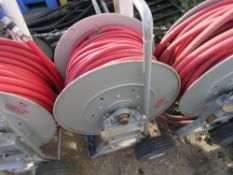 HOSE REEL ON TROLLEY.