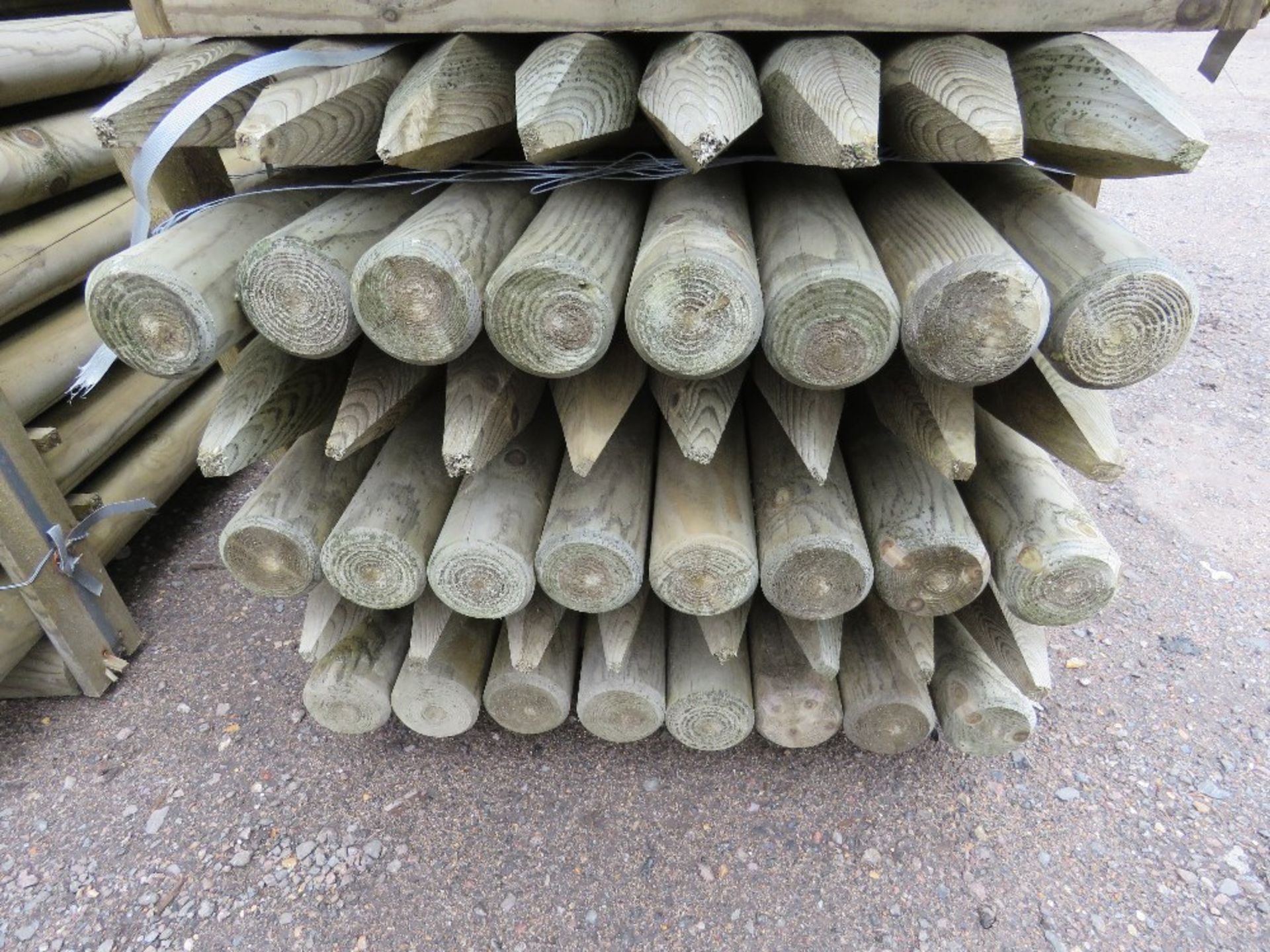 48 X TREATED TIMBER FENCING STAKES 5FT LENGTH APPROX X 9CM DIAMETER. - Image 3 of 3