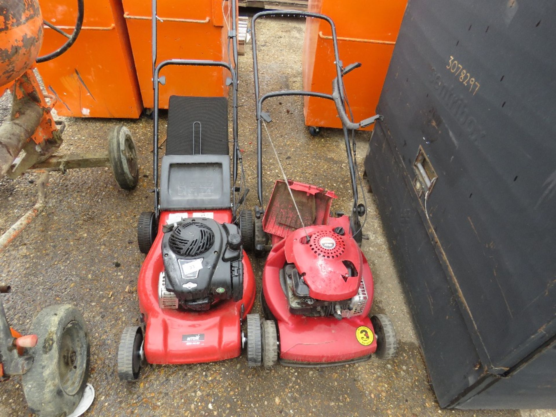 MTD RED PETROL ENGINED LAWN MOWER PLUS ANOTHER.